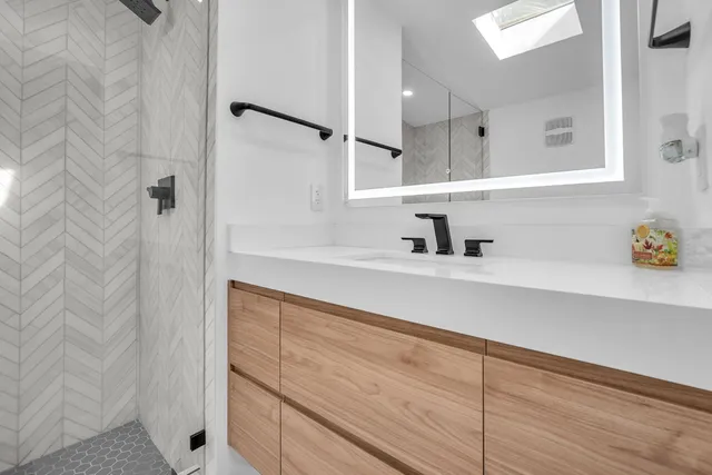 a backyard of a house with plants and trees