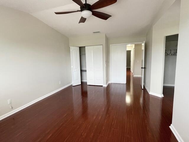 6763 Via Regina Boca Raton, FL 33433 - Photo 13 of 39 a view of an empty room with wooden floor