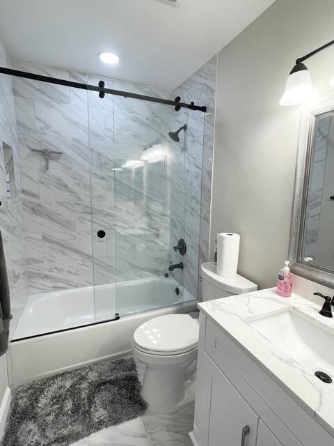 6763 Via Regina Boca Raton, FL 33433 - Photo 23 of 39 a bathroom with a sink toilet and shower