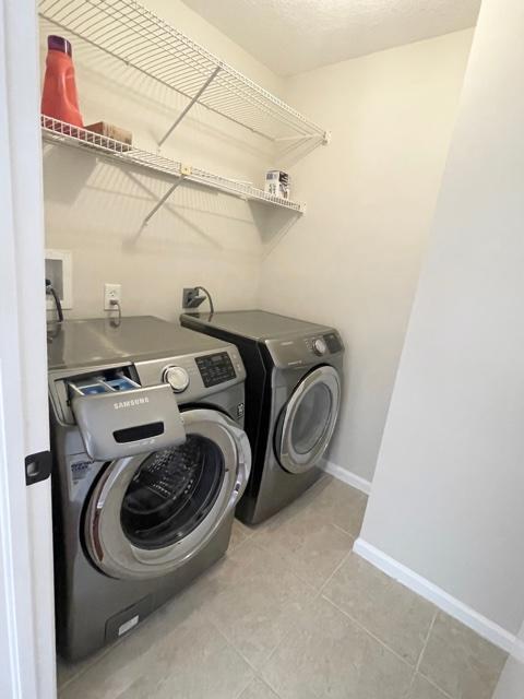 6763 Via Regina Boca Raton, FL 33433 - Photo 26 of 39 a utility room with dryer and washer
