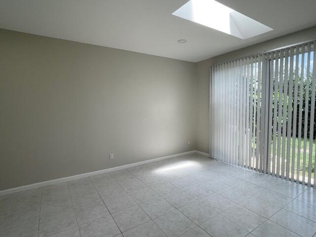 6763 Via Regina Boca Raton, FL 33433 - Photo 31 of 39 an empty room with windows