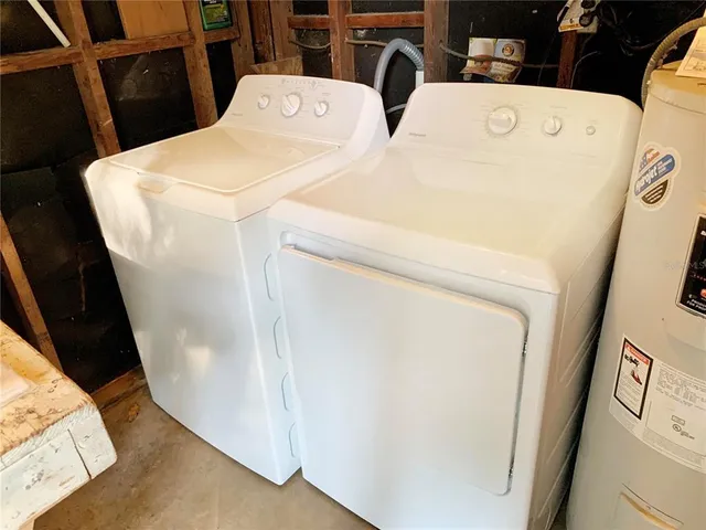 a utility room with dryer and washer