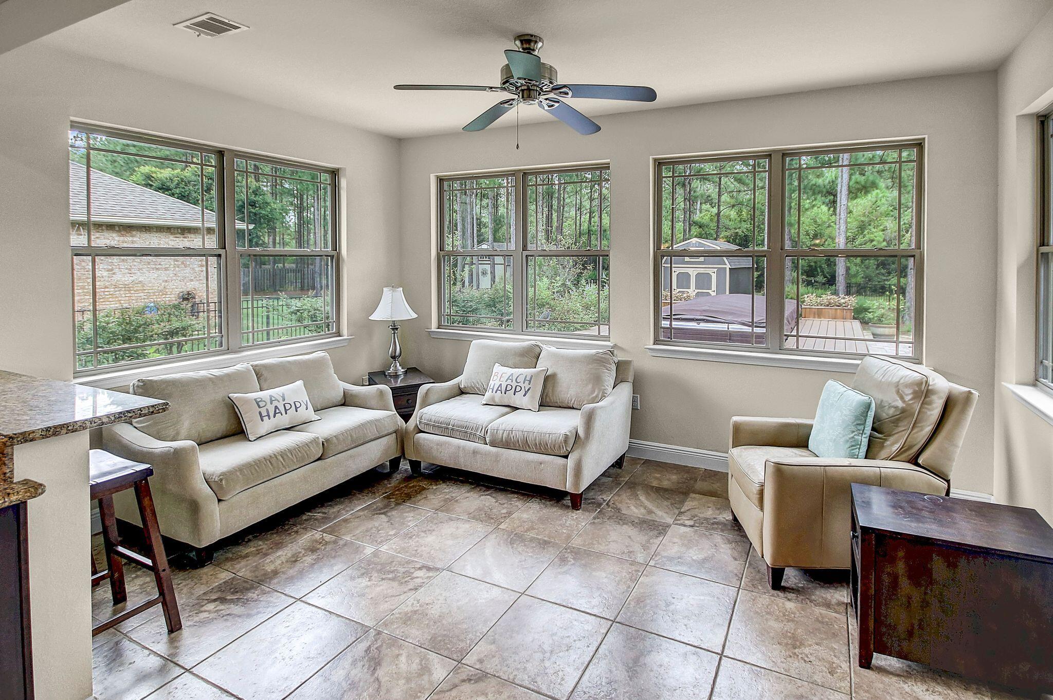 28 Haven Way Freeport, FL 32439 - Photo 14 of 50 a living room with furniture and a large window