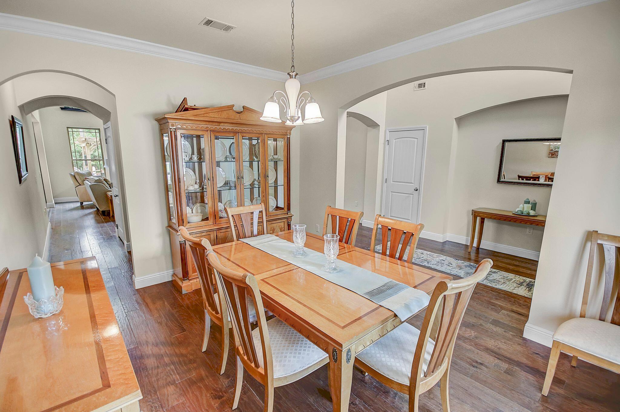 28 Haven Way Freeport, FL 32439 - Photo 18 of 50 a view of a dining room with furniture window and wooden floor