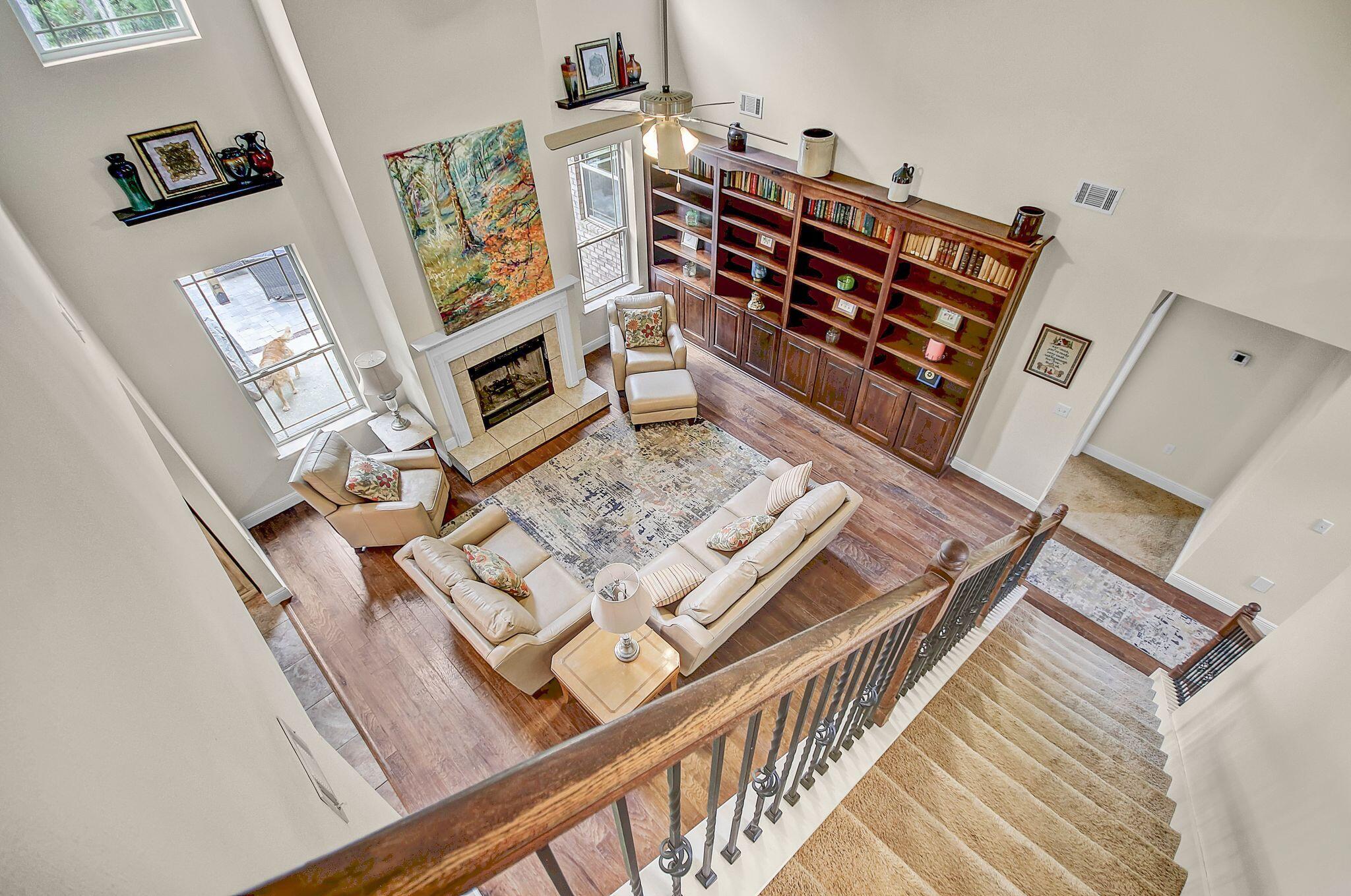 28 Haven Way Freeport, FL 32439 - Photo 21 of 50 a view of living room and workspace with wooden floor