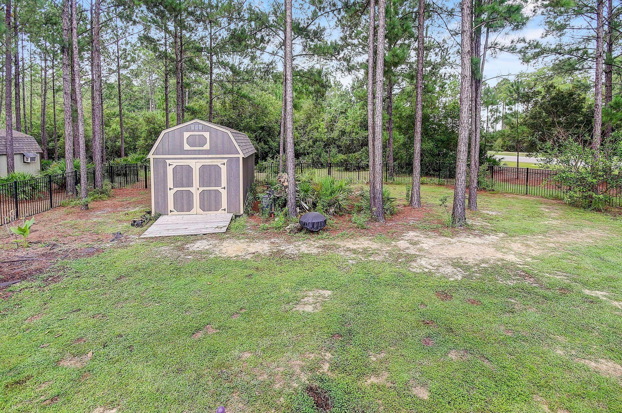 28 Haven Way Freeport, FL 32439 - Photo 40 of 50 a view of a tiny house with yard and sitting area