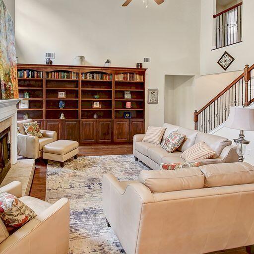 28 Haven Way Freeport, FL 32439 - Photo 8 of 50 a living room with furniture a rug and a bookshelf