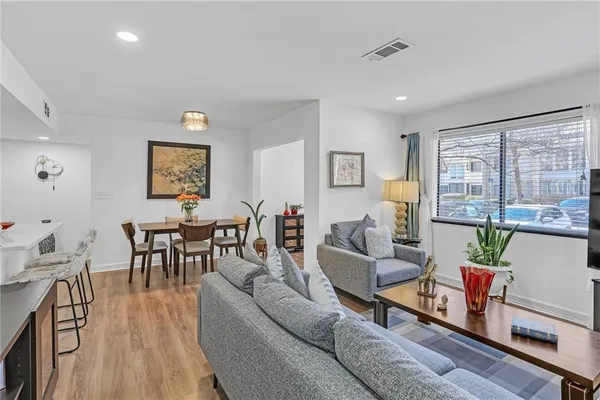 a living room with furniture and a table