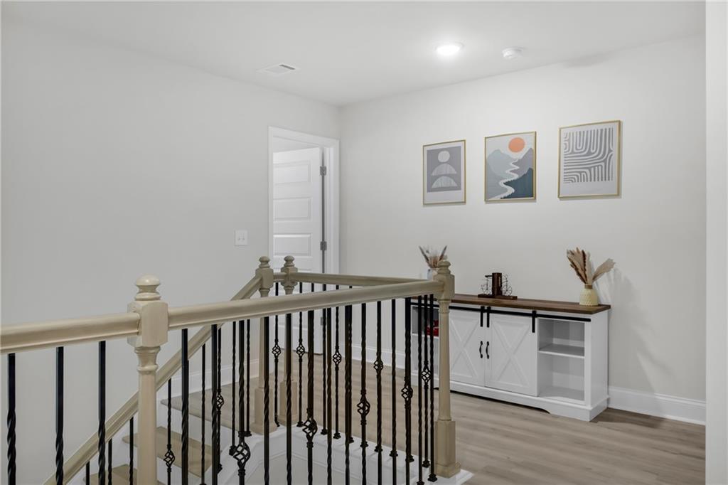 6710 Cedar Glen Road Atlanta, GA 30360 - Photo 18 of 35 a view of a hallway with windows