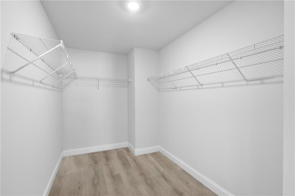 6710 Cedar Glen Road Atlanta, GA 30360 - Photo 26 of 35 a view of a room with racks on the wall