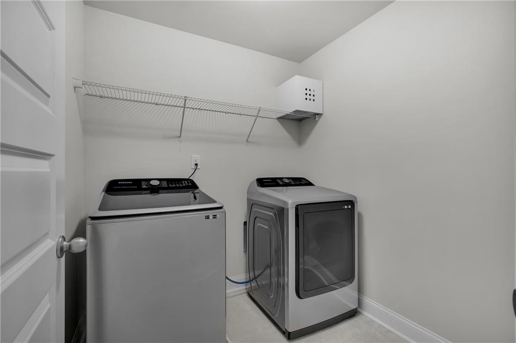 6710 Cedar Glen Road Atlanta, GA 30360 - Photo 33 of 35 a utility room with dryer and washer