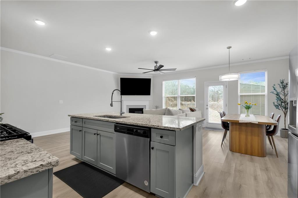 6710 Cedar Glen Road Atlanta, GA 30360 - Photo 10 of 35 a kitchen with a sink and cabinets