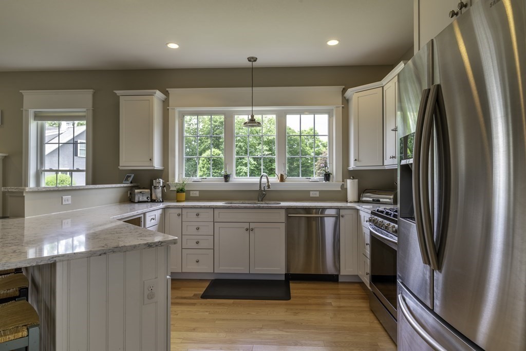 2 Chatham Way South Hadley, MA 01075 - Photo 11 of 40 a kitchen with a sink refrigerator and window