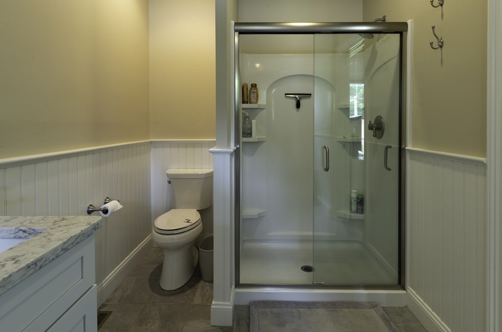 2 Chatham Way South Hadley, MA 01075 - Photo 19 of 40 a bathroom with a granite countertop sink toilet and shower