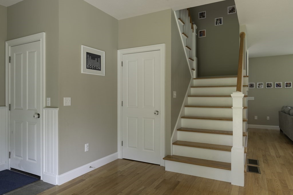 2 Chatham Way South Hadley, MA 01075 - Photo 21 of 40 a view of entryway with wooden floor and stairs