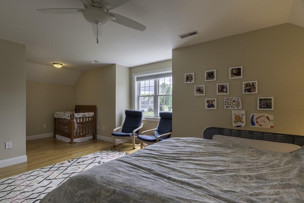 2 Chatham Way South Hadley, MA 01075 - Photo 25 of 40 a bedroom with a bed and a large window
