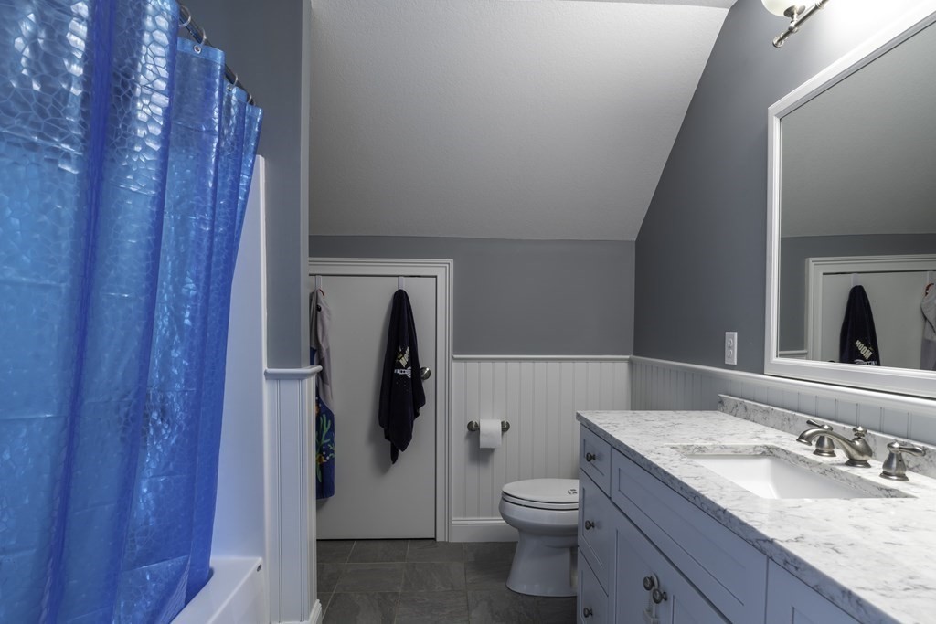 2 Chatham Way South Hadley, MA 01075 - Photo 28 of 40 a bathroom with a granite countertop sink toilet and shower
