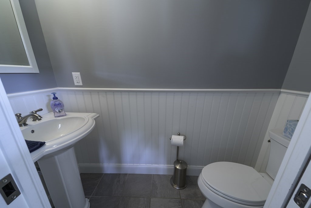 2 Chatham Way South Hadley, MA 01075 - Photo 31 of 40 a bathroom with a sink a toilet and a mirror