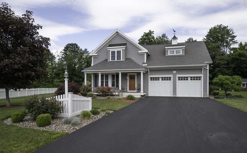 2 Chatham Way South Hadley, MA 01075 - Photo 33 of 40 a front view of a house with sitting area and garden