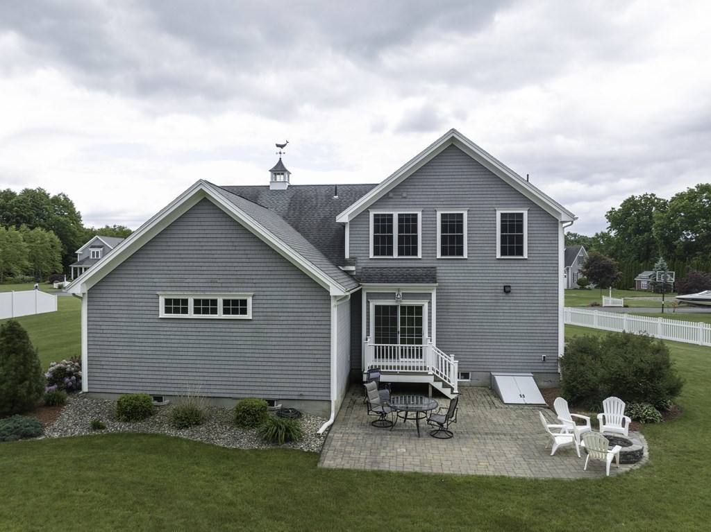 2 Chatham Way South Hadley, MA 01075 - Photo 6 of 40 a backyard of a house with table and chairs