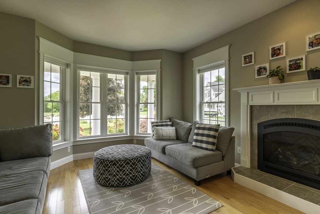 2 Chatham Way South Hadley, MA 01075 - Photo 8 of 40 a living room with furniture and a fireplace
