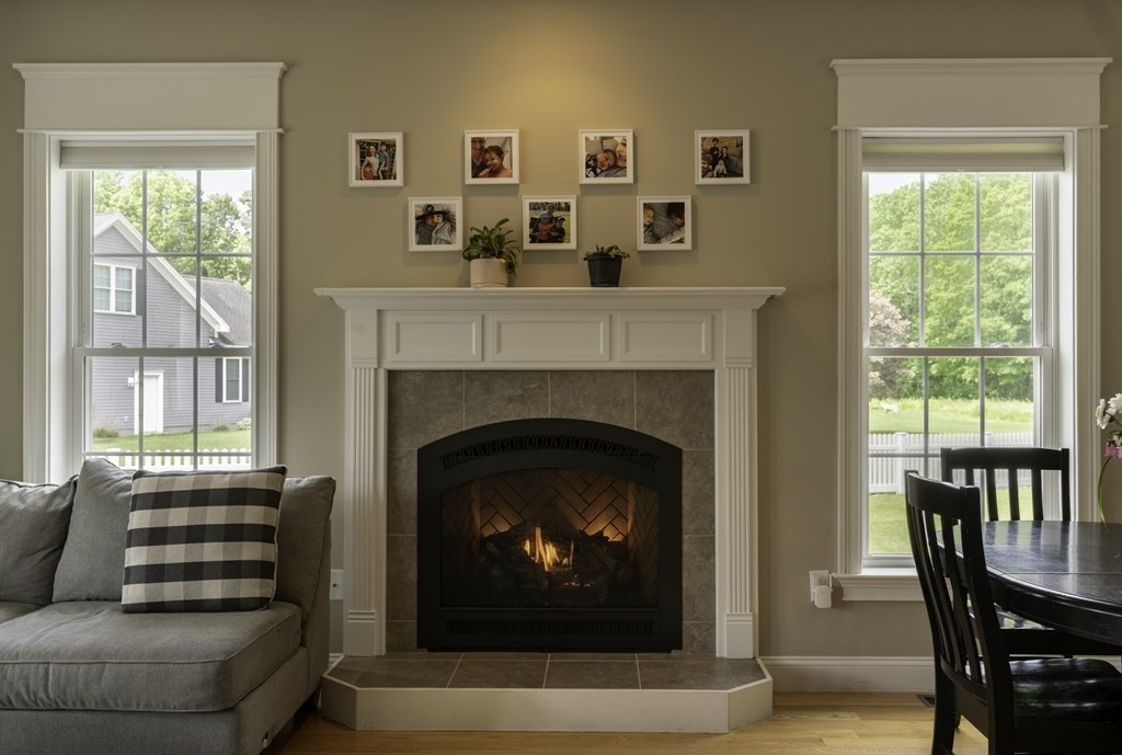 2 Chatham Way South Hadley, MA 01075 - Photo 9 of 40 a living room with furniture a window and a fireplace