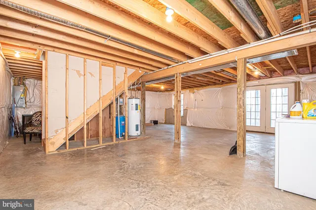 a view of a room with wooden walls