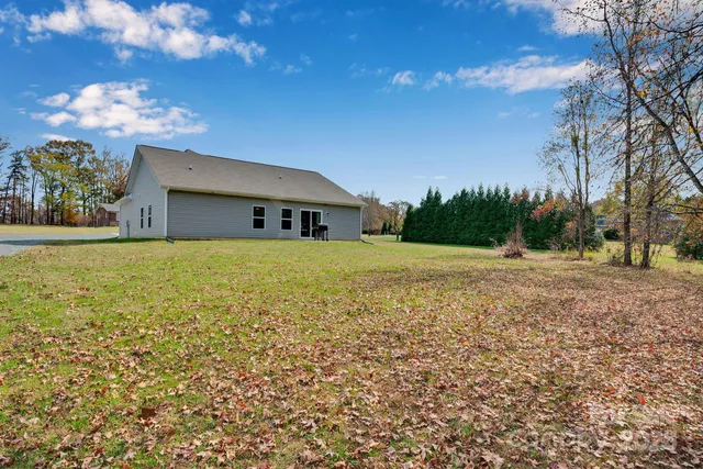 a view of a lake with a yard
