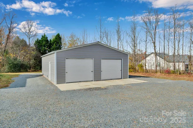 a view of a swimming pool with a yard