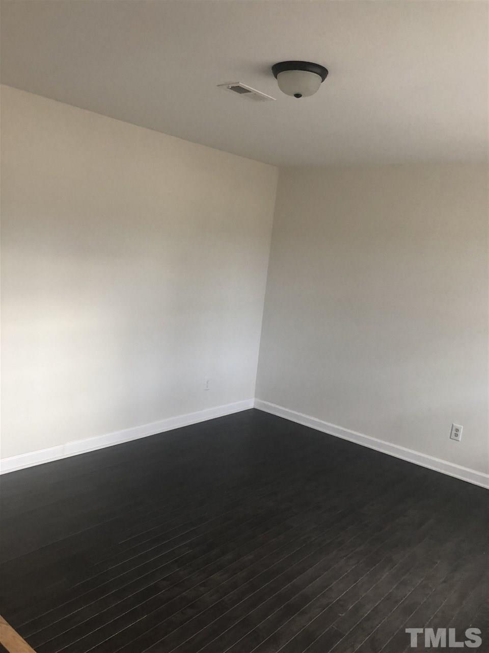 2900 Alron Road Wendell, NC 27591 - Photo 5 of 15 a view of an empty room with wooden floor