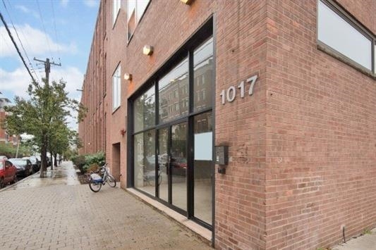 1017 Jefferson Street, Unit 321 Hoboken, NJ 07030 - Photo 1 of 10 a view of a brick buildings with entryway doors