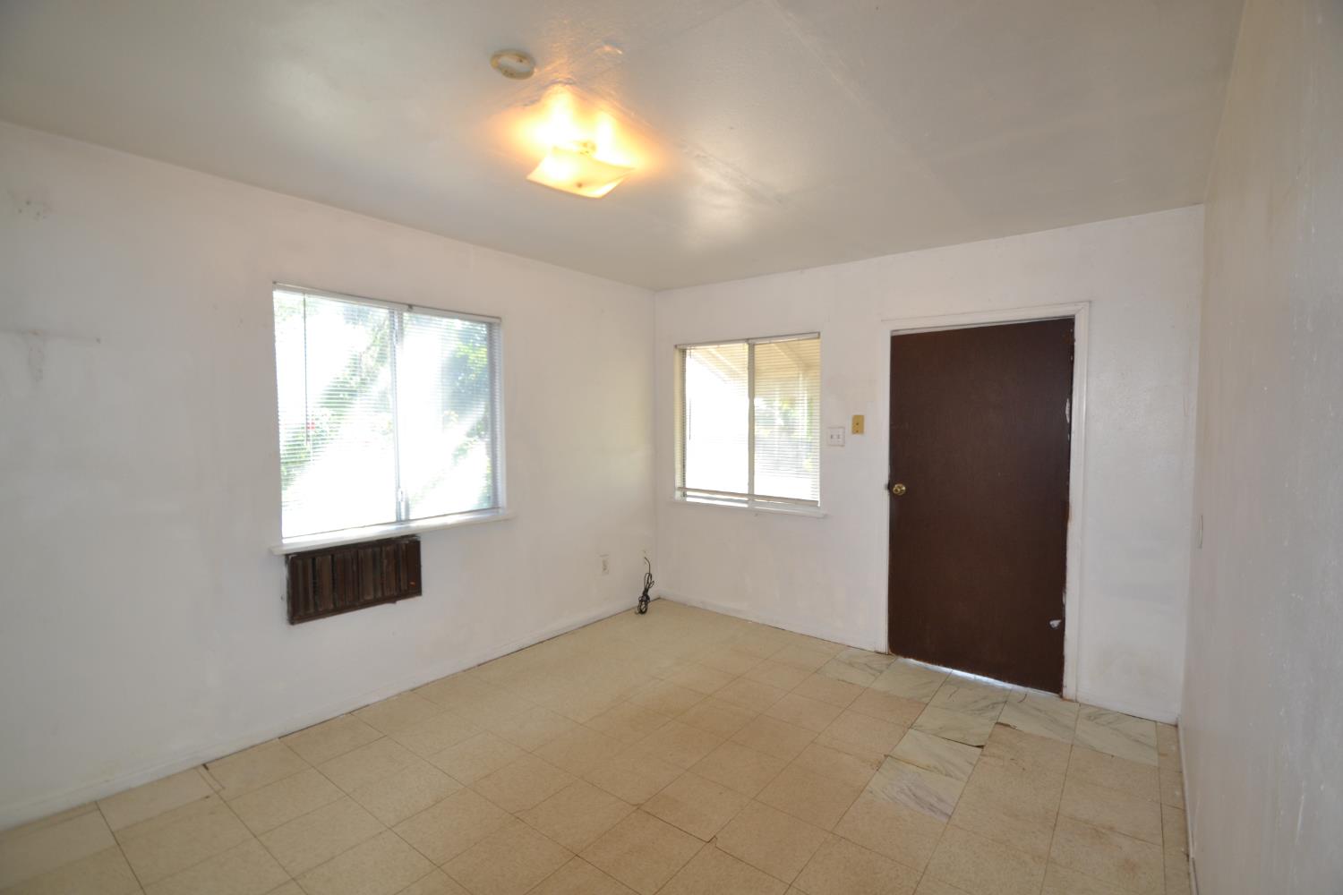 188 Justine Avenue Reedley, CA 93654 - Photo 11 of 20 a view of an empty room with a window