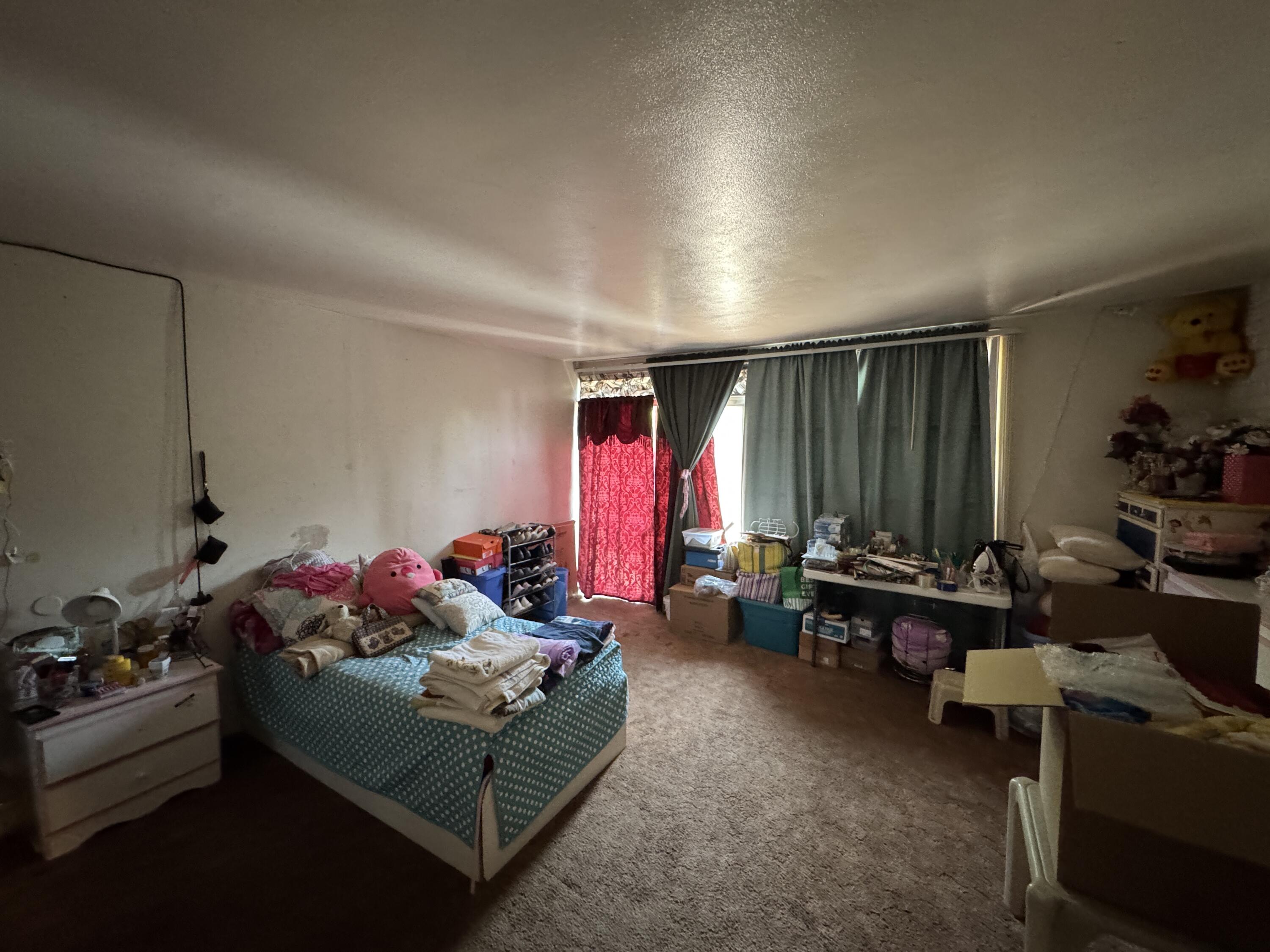 704 North Floral Street Visalia, CA 93291 - Photo 17 of 51 a living room with furniture and a window