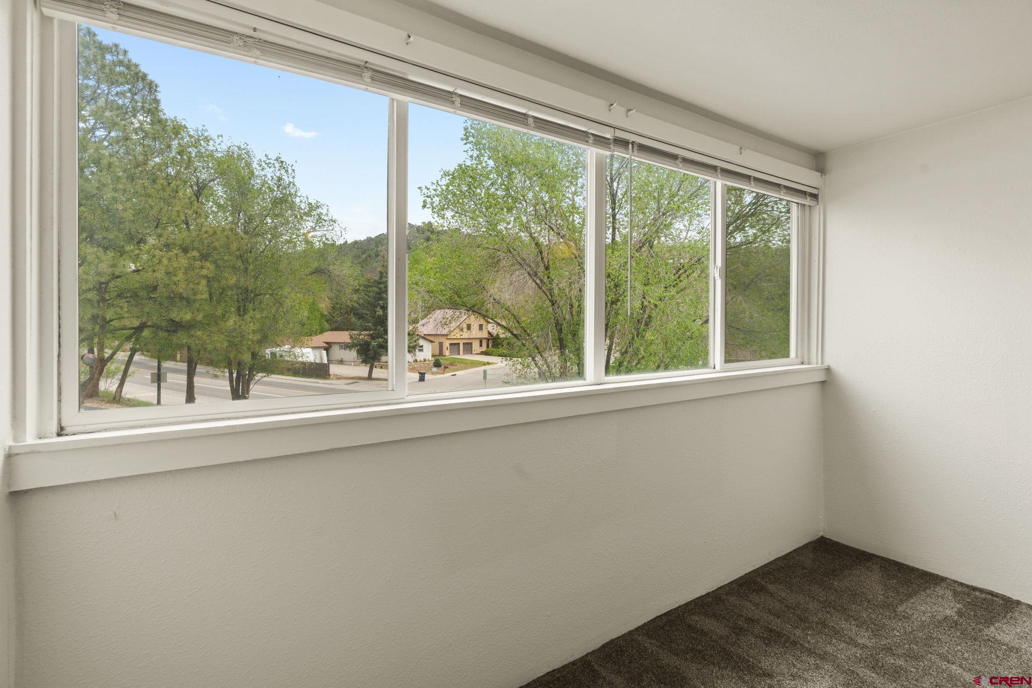 1135 Florida Road, Unit A29 Durango, CO 81301 - Photo 15 of 33 a view of a room that has a large window and front view