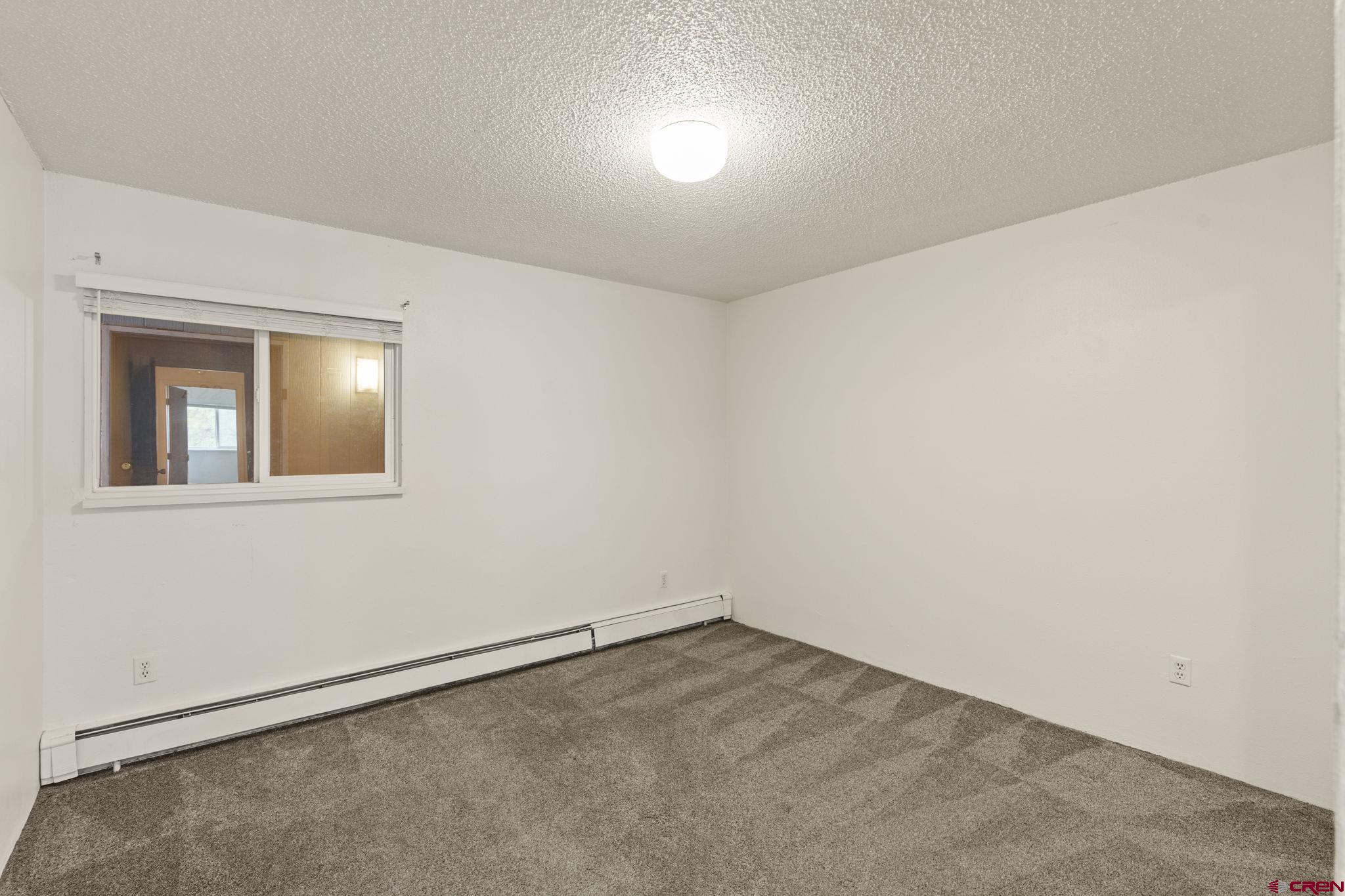1135 Florida Road, Unit A29 Durango, CO 81301 - Photo 19 of 33 an empty room with a empty space