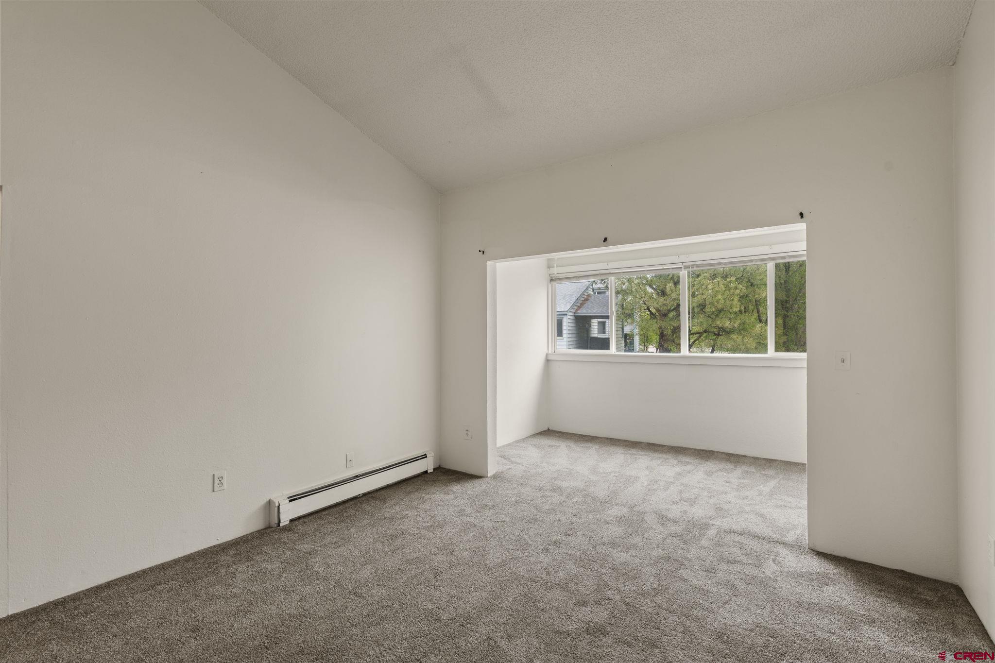 1135 Florida Road, Unit A29 Durango, CO 81301 - Photo 4 of 33 an empty room with windows
