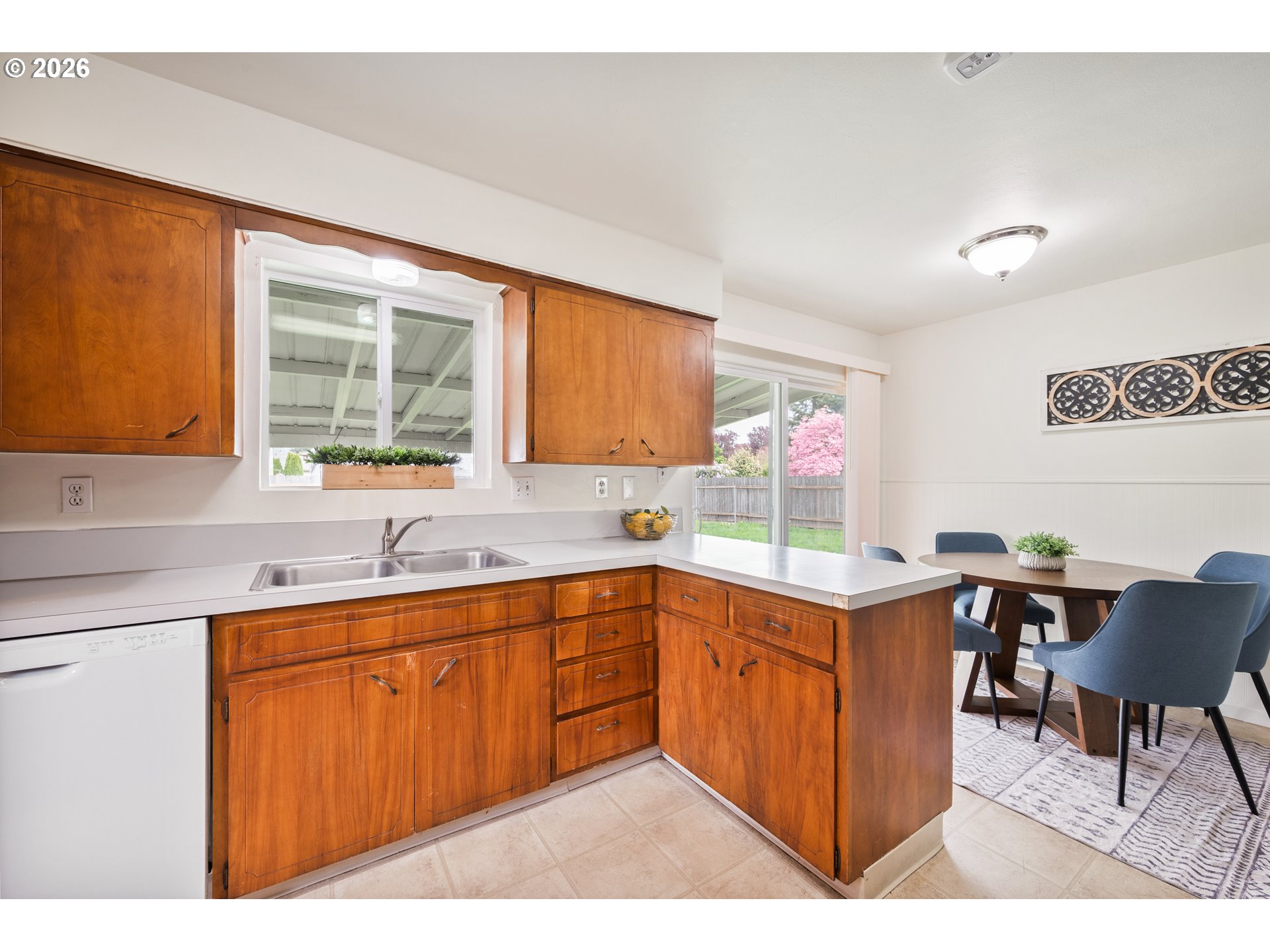 8 Terry Court Longview, WA 98632 - Photo 11 of 32 a kitchen with a sink cabinets and window