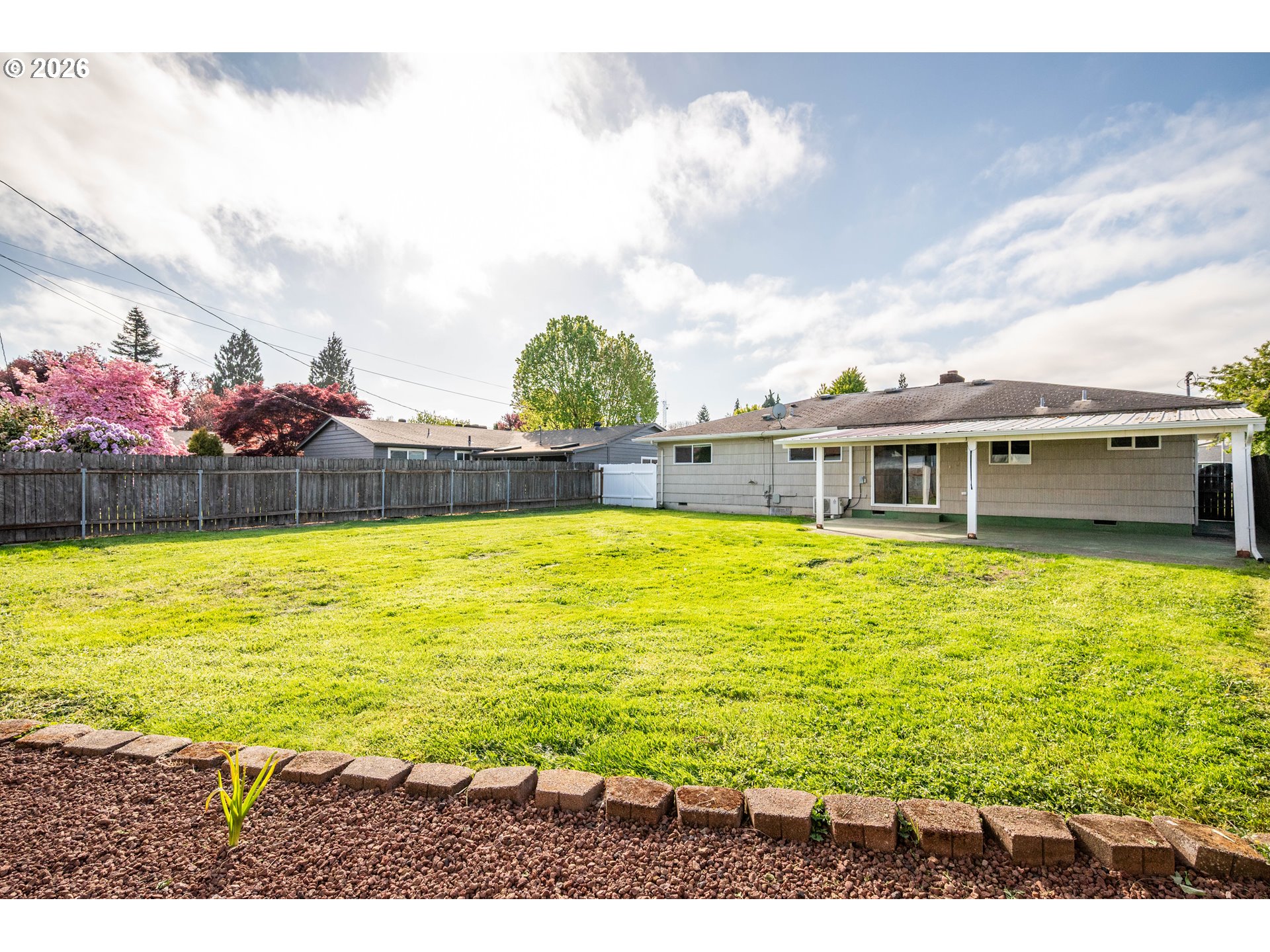 8 Terry Court Longview, WA 98632 - Photo 24 of 32 a swimming pool with outdoor seating and yard