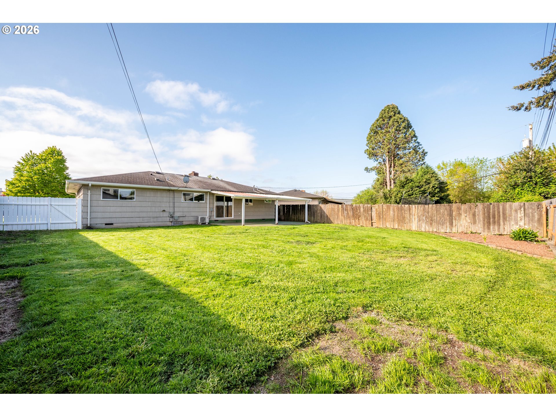 8 Terry Court Longview, WA 98632 - Photo 25 of 32 a view of a house with a backyard