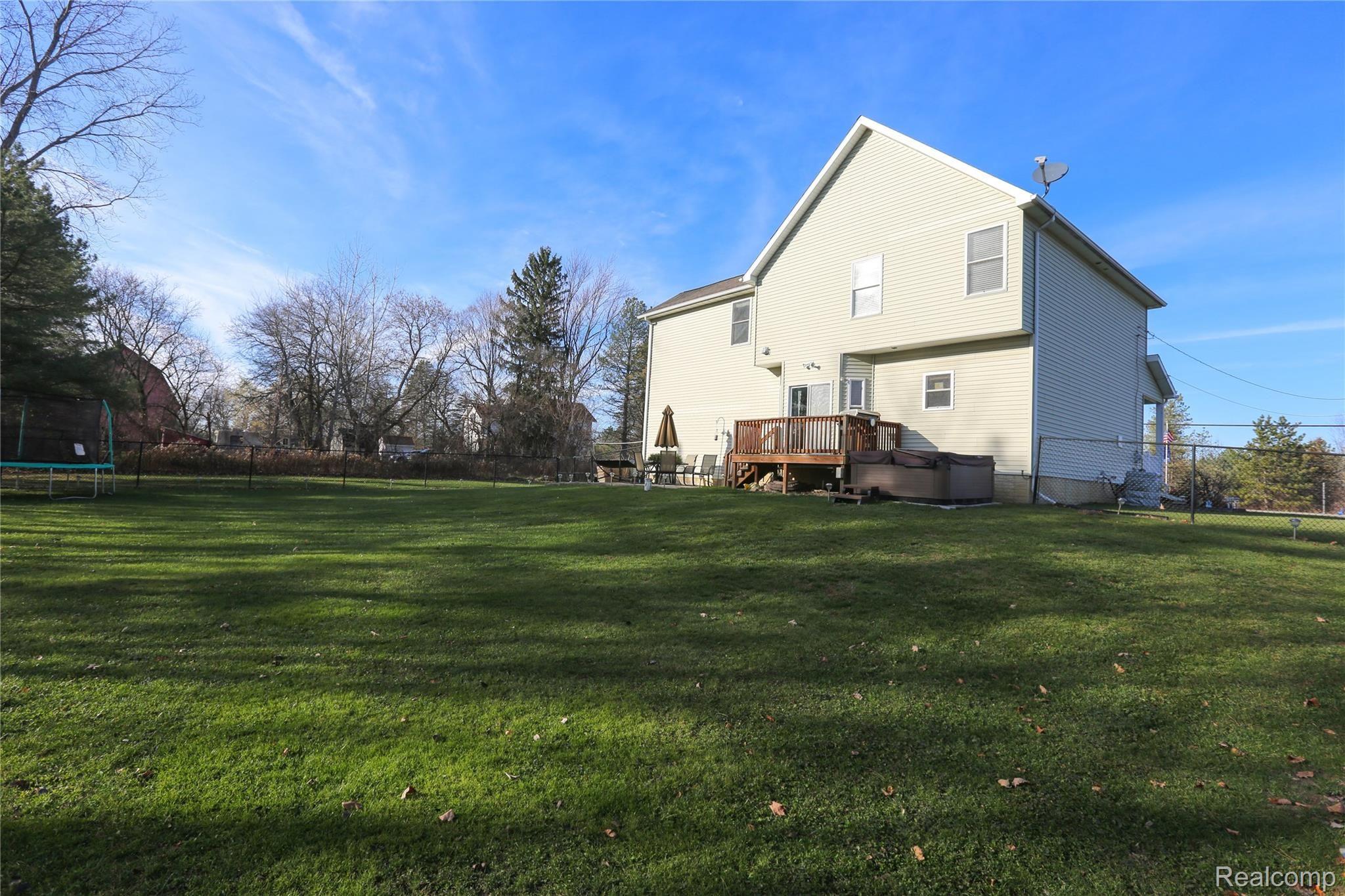 2120 East Vienna Road Clio, MI 48420 - Photo 33 of 37 Back Of Home Has Large Fenced Area!