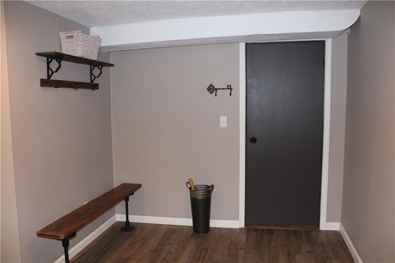 80 Duff Road Pittsburgh, PA 15235 - Photo 22 of 25 Come in from the 2 car garage, sit down on the built in bench to take off your shoes and hang your coat and keys.