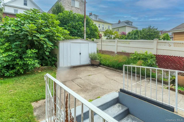a view of backyard with green space