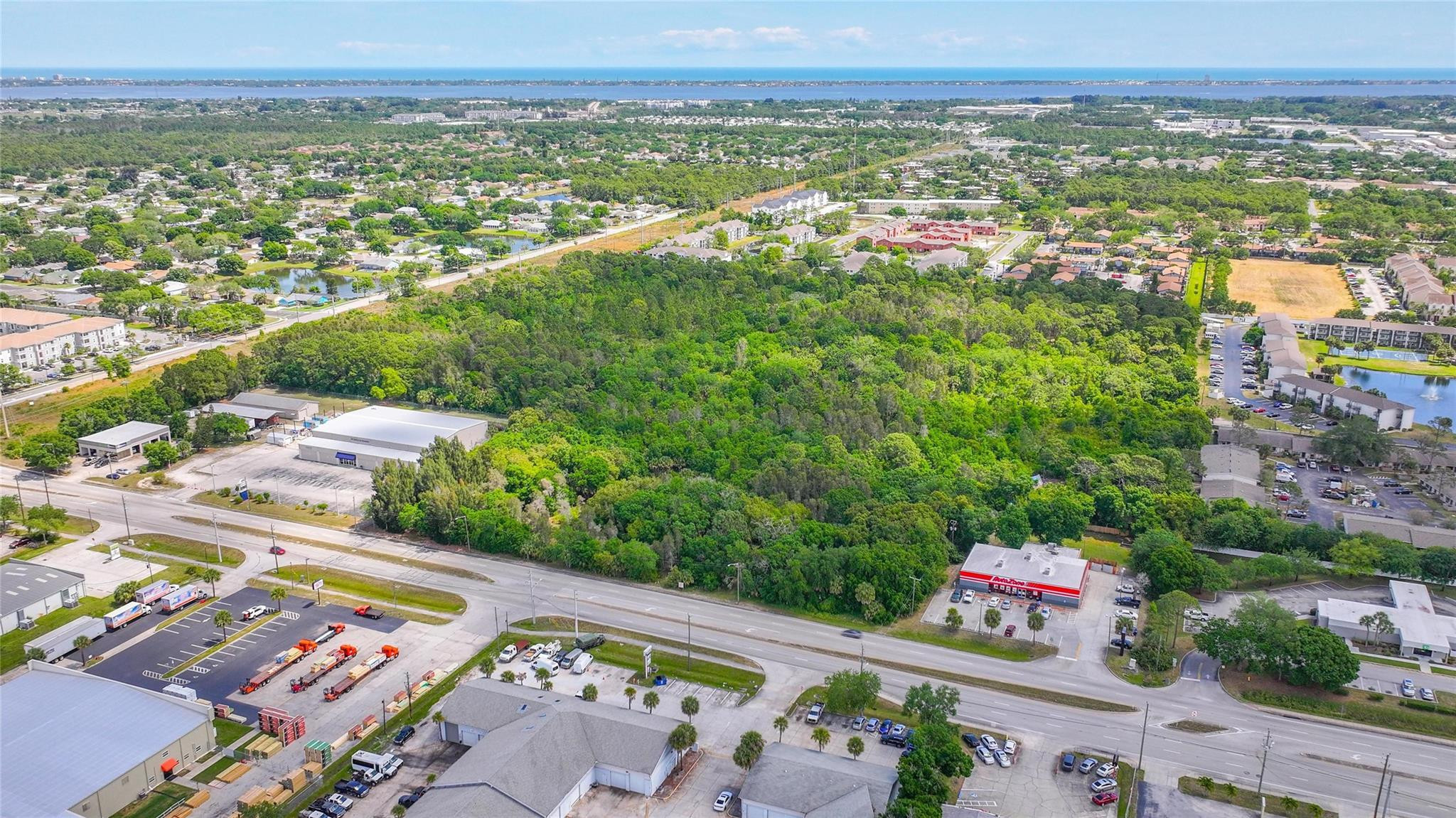 4527 South Babcock Street Palm Bay, FL 32905 - Photo 11 of 16 an aerial view of multiple house