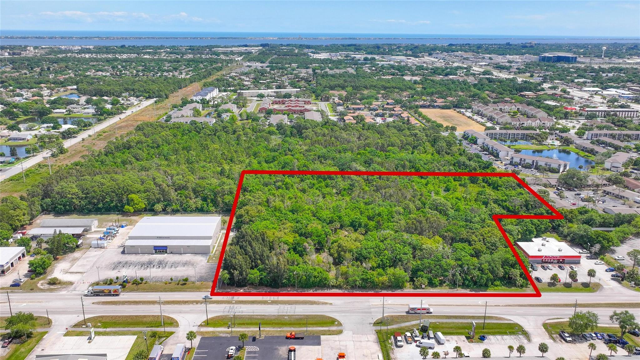 4527 South Babcock Street Palm Bay, FL 32905 - Photo 2 of 16 a view of city with tall buildings