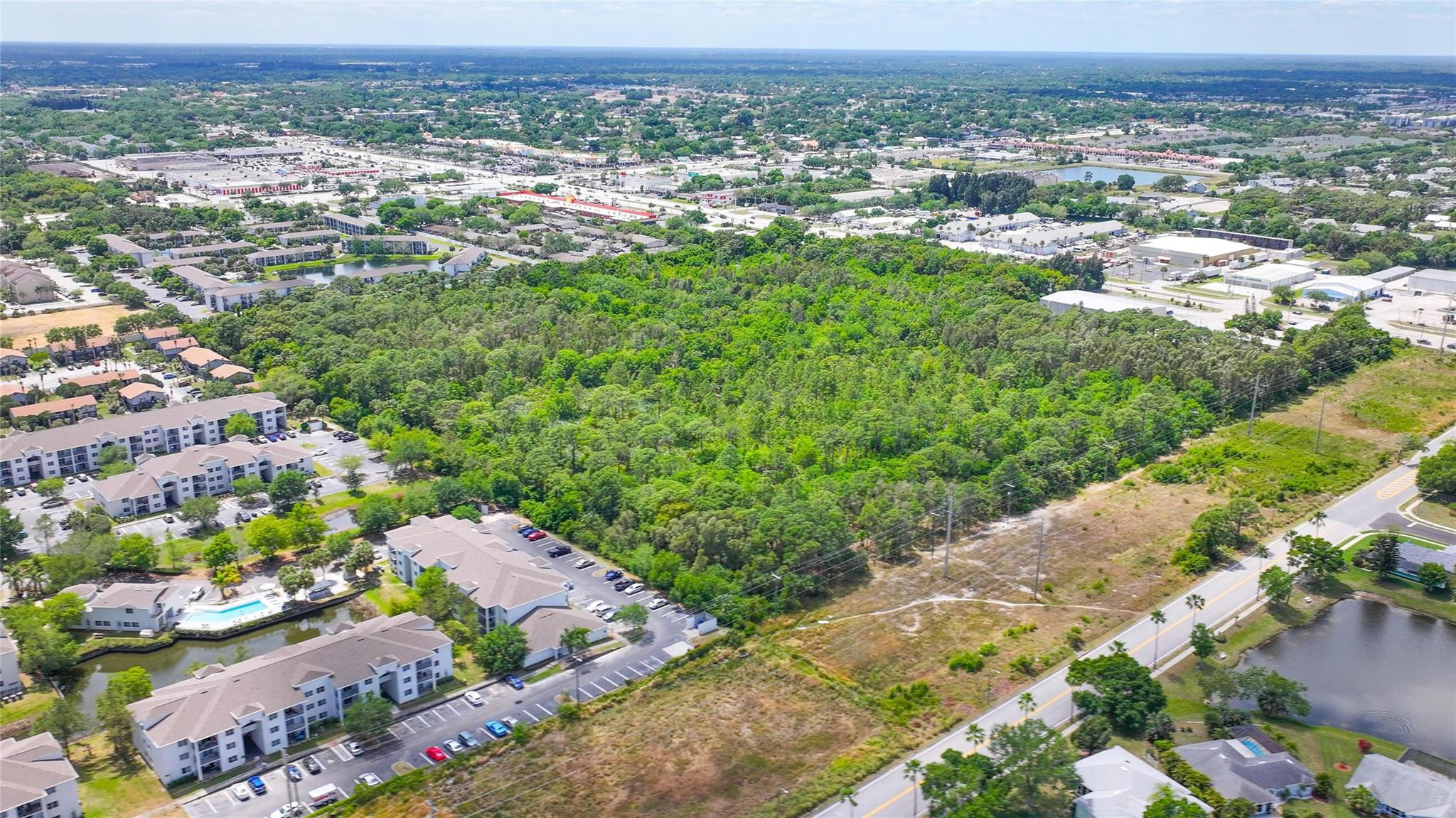 4527 South Babcock Street Palm Bay, FL 32905 - Photo 10 of 16 an aerial view of multiple house