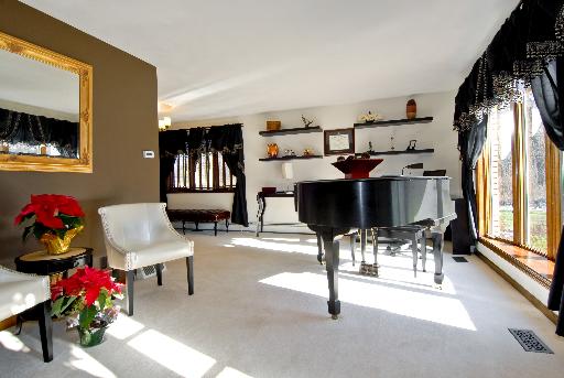 38W714 Old Homestead Road St. Charles, IL 60175 - Photo 2 of 16 a living room with furniture and flowers