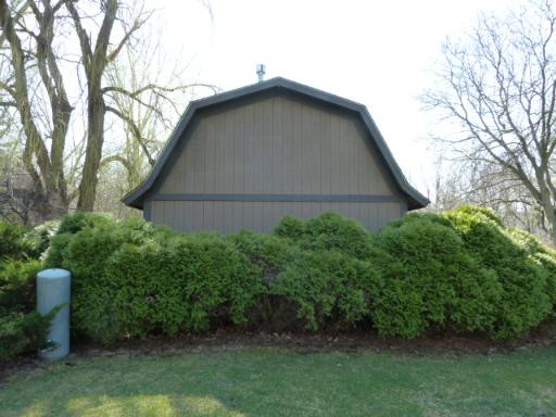 38W714 Old Homestead Road St. Charles, IL 60175 - Photo 15 of 16 a house with trees in the background