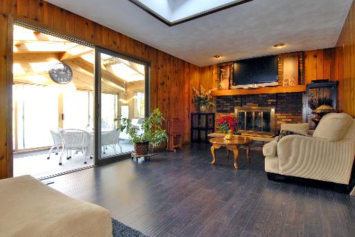 38W714 Old Homestead Road St. Charles, IL 60175 - Photo 5 of 16 a living room with furniture and a large window