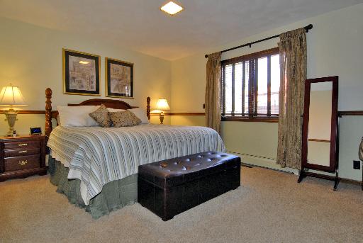 38W714 Old Homestead Road St. Charles, IL 60175 - Photo 7 of 16 a bedroom with a bed and a window