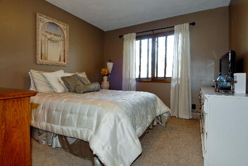 38W714 Old Homestead Road St. Charles, IL 60175 - Photo 8 of 16 a bedroom with a bed and wooden floor